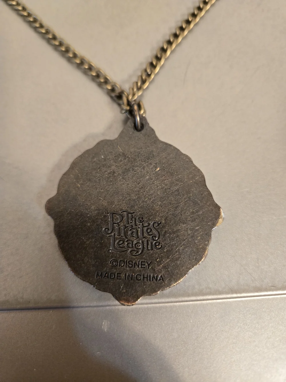 Disney Parks Pirates of the Caribbean Medallion The Pirates League Skull Pendant